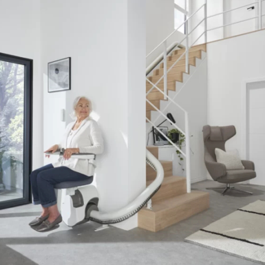 Curved stair lift